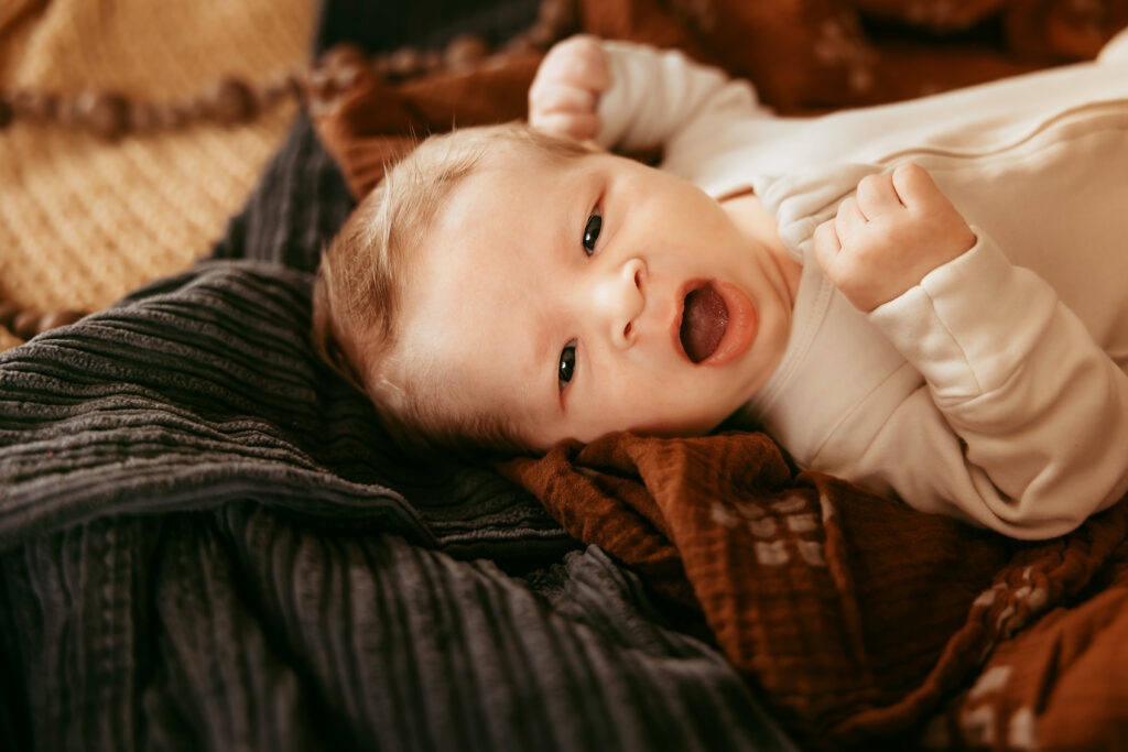 Newborn Baby Boy awake and yawning