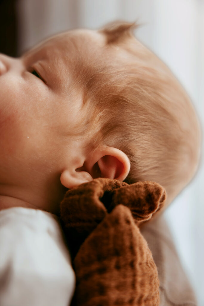 newborn baby ears and hair