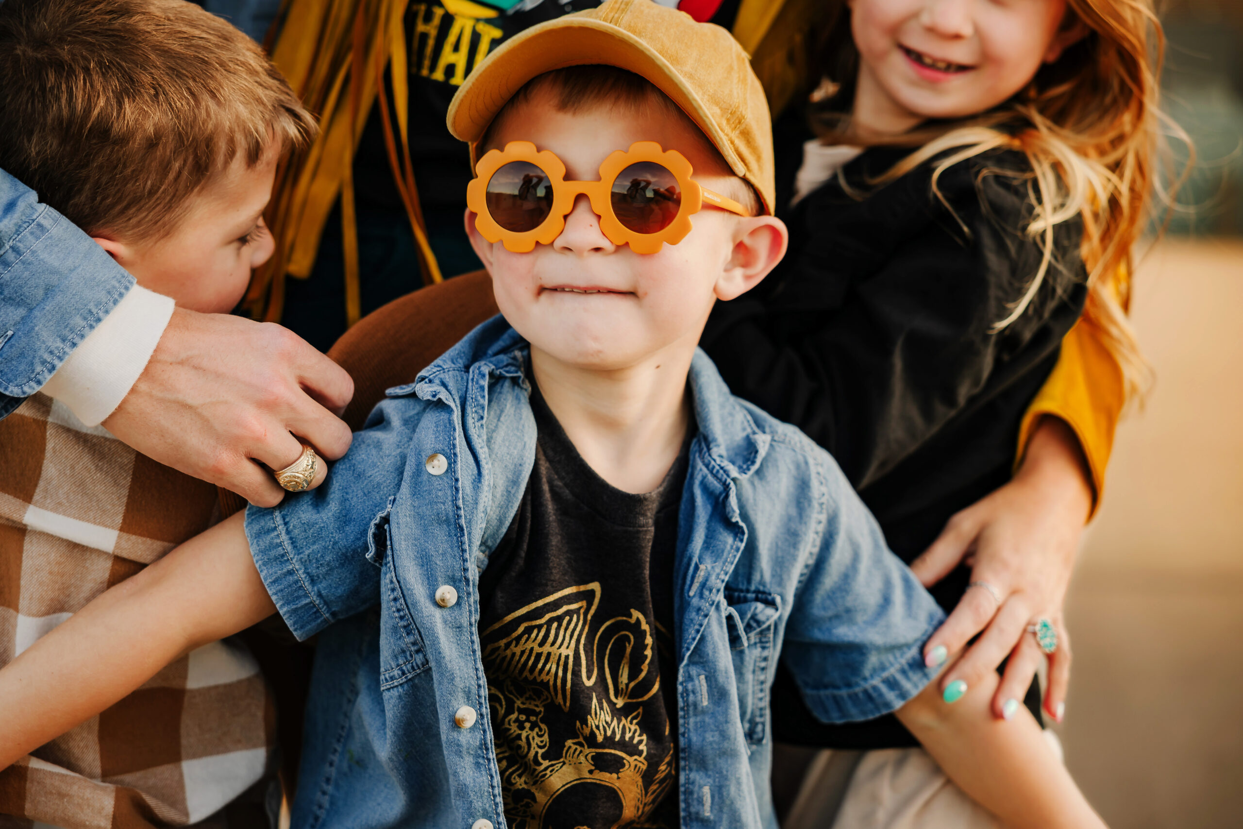 boy in flower yellow sunglasses