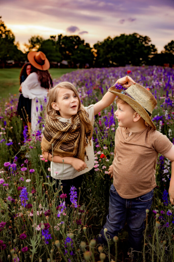 Boys playing in a flower meadow