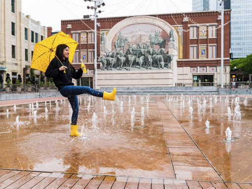kicking the puddles in downtown Fort Worth