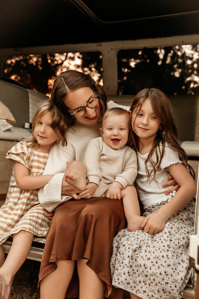 family smiling during an evening shoot