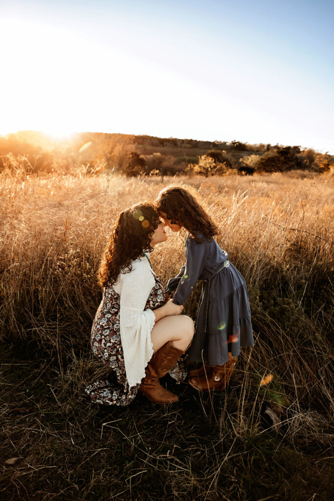 mother and daughter share a moment during a fall family photoshoot