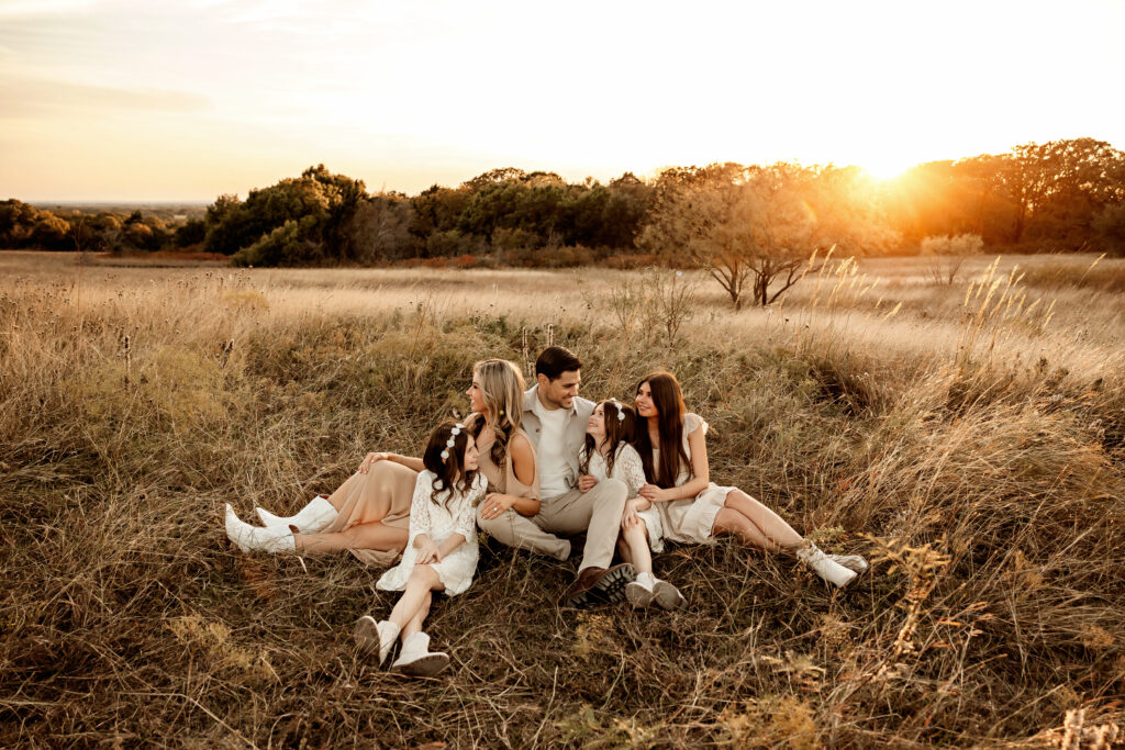 fall family photos at sunset in a golden field