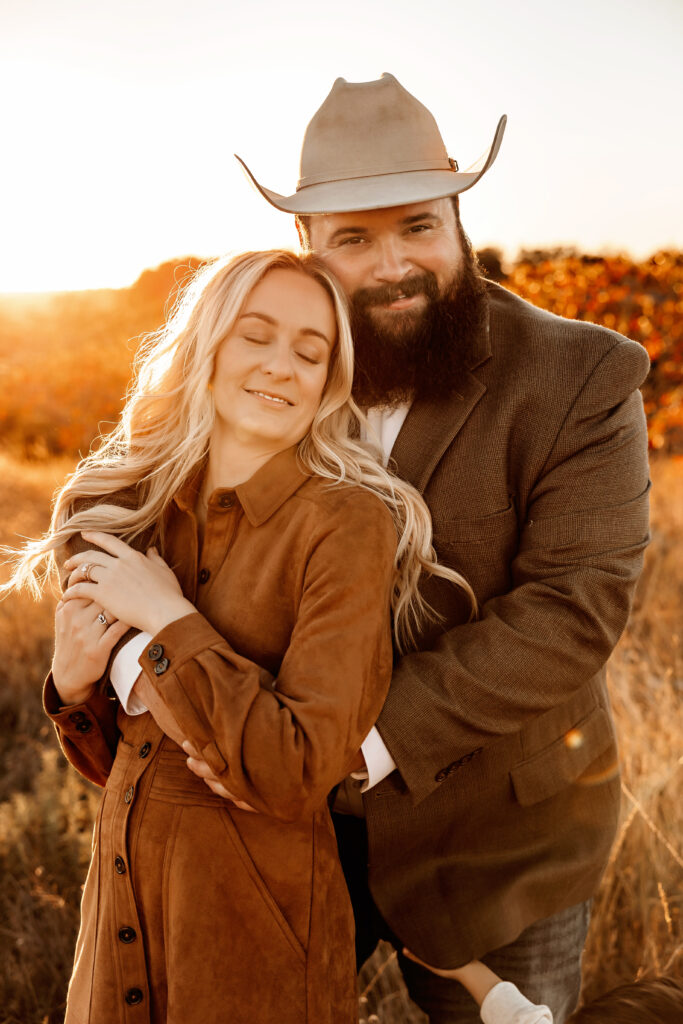 Quiet love revealed in soft light as mom smiles – lifestyle family photography Fort Worth