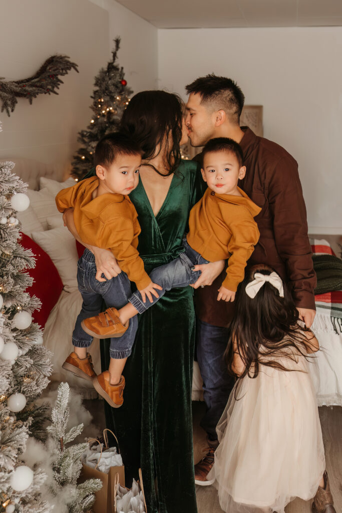 Family photo at Fort Worth Christmas indoor studio with winter styling